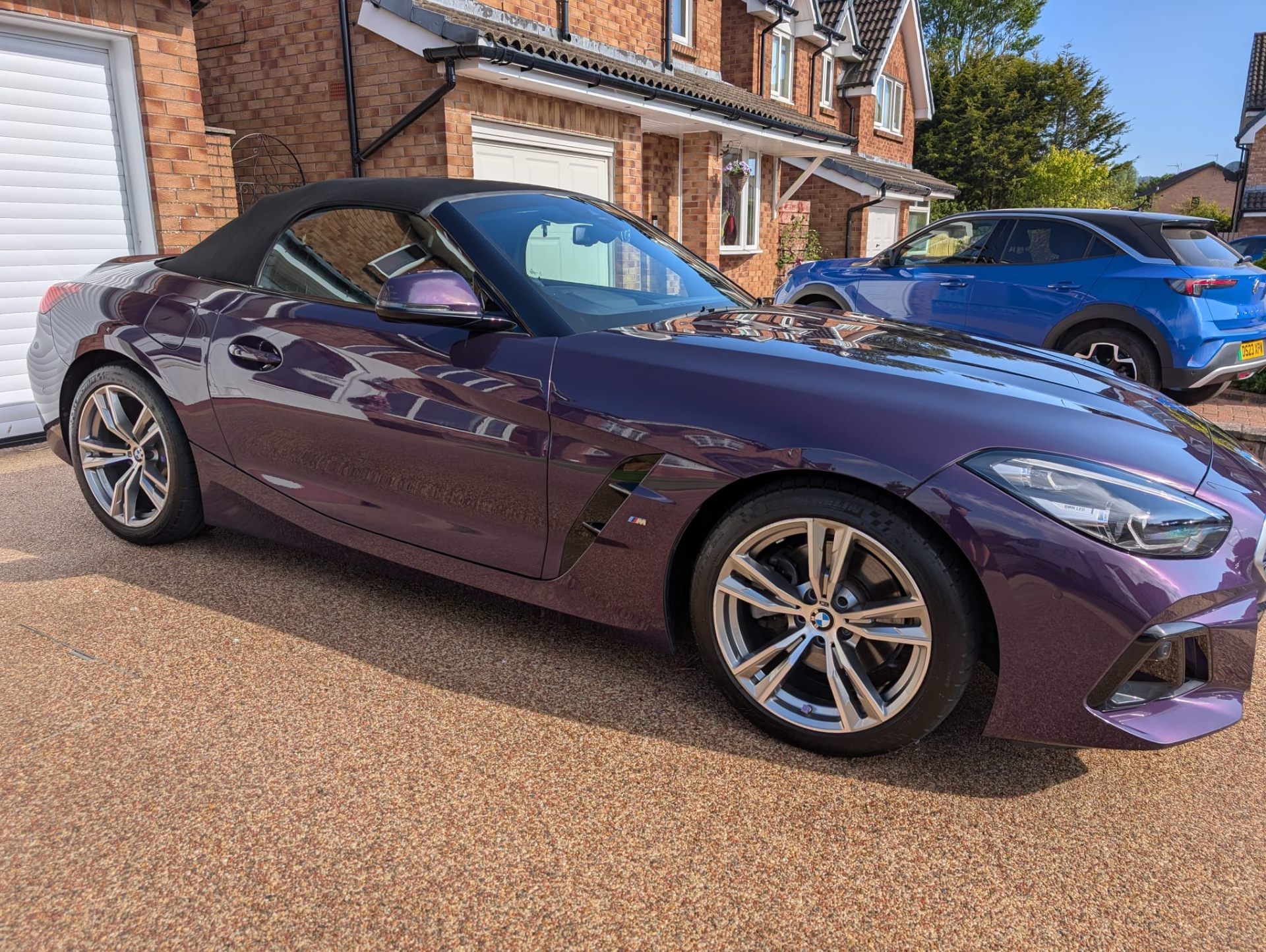 Purple BMW Z4 M40i side view after gloss enhancement